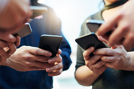 people on their mobile phones