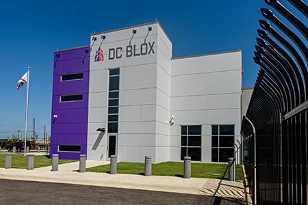 DC BLOX data center exterior with fence for security