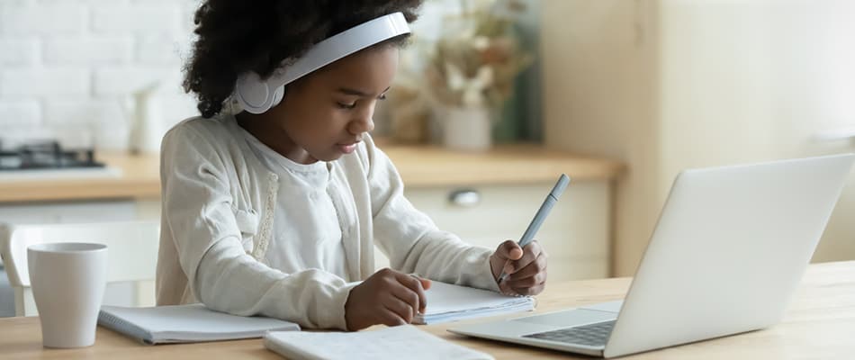 girl on laptop at home