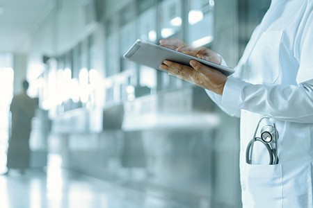 health care worker on table inside hospital